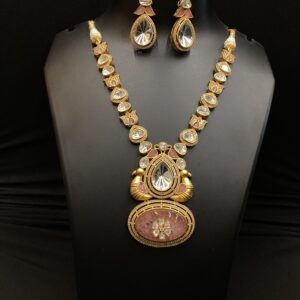 Pink and mossanaite stone set
